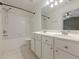 Bathroom with double sink vanity, tub, and shower at 5589 Trace Views Dr, Norcross, GA 30071