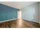 This bedroom features hardwood floors and neutral paint, offering a modern and comfortable space at 5589 Trace Views Dr, Norcross, GA 30071