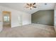 Spacious bedroom with vaulted ceilings and ensuite bathroom at 5589 Trace Views Dr, Norcross, GA 30071