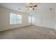 Bright bedroom with large windows and a ceiling fan at 5589 Trace Views Dr, Norcross, GA 30071