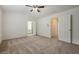 Bedroom with neutral carpet, ensuite bathroom and closet at 5589 Trace Views Dr, Norcross, GA 30071
