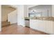 Kitchen area features granite countertops, stainless steel appliances, and open view to stairwell at 5589 Trace Views Dr, Norcross, GA 30071