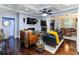 A view of the open living room and its inviting and comfortable seating arrangement at 1547 Paxton Sw Dr, Lilburn, GA 30047