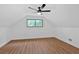Finished attic space with wood-look floors and a window at 1731 Maryland Sw Ave, Marietta, GA 30008