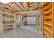 Unfinished basement with painted concrete floor, exposed ceiling with insulation, and potential for versatile usage at 1731 Maryland Sw Ave, Marietta, GA 30008
