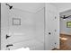 Clean bathroom features a tiled shower with black hardware at 1731 Maryland Sw Ave, Marietta, GA 30008