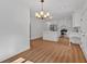 Open eat-in kitchen with kitchen island and stainless appliances at 1731 Maryland Sw Ave, Marietta, GA 30008