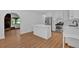 Open concept kitchen with a large island and stainless steel appliances at 1731 Maryland Sw Ave, Marietta, GA 30008