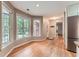 Eat-in kitchen with stainless refrigerator, granite counters, hardwood floors and lots of windows at 245 Sutallee Ridge Ne Ln, White, GA 30184