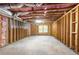 Unfinished basement with exposed beams, insulation, and concrete floor at 4457 Equity Ct, Ellenwood, GA 30294