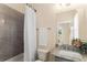 Bathroom with granite countertop vanity, white shower curtain, and a framed mirror at 4457 Equity Ct, Ellenwood, GA 30294