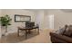 Office space with desk, comfortable seating and large mirror at 4457 Equity Ct, Ellenwood, GA 30294