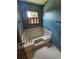 Bathroom with wallpaper, a window and a large soaking tub at 1471 Ashwood Way, Lawrenceville, GA 30043