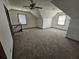 Spacious bonus room features neutral walls and large windows at 1471 Ashwood Way, Lawrenceville, GA 30043