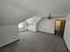 Large bonus room features two windows, a ceiling fan, and neutral walls at 1471 Ashwood Way, Lawrenceville, GA 30043