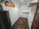 Walk-in storage area with wood-look flooring at 1471 Ashwood Way, Lawrenceville, GA 30043