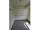 Walk-in closet with carpet and shelving for optimal organization at 1471 Ashwood Way, Lawrenceville, GA 30043