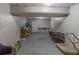 Spacious unfinished basement area with ample storage, a workbench, and potential for customization at 2320 Boone Pl, Snellville, GA 30078