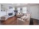 Cozy living room featuring hardwood floors, a fireplace, and comfortable seating at 2320 Boone Pl, Snellville, GA 30078