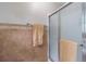 Beautiful shower with tile walls and a glass door, providing a spa-like experience at 2320 Boone Pl, Snellville, GA 30078