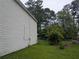 The backyard includes a fence and mature trees at 345 Staten St, Jonesboro, GA 30238