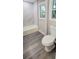 Renovated bathroom with new tile tub surround at 4059 Canby Ln, Decatur, GA 30035