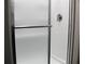 Frameless glass shower door with brushed nickel hardware at 4059 Canby Ln, Decatur, GA 30035