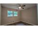 Bright bedroom with a ceiling fan and updated flooring at 4059 Canby Ln, Decatur, GA 30035