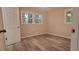 Bedroom features modern flooring and two windows offering natural light at 4059 Canby Ln, Decatur, GA 30035