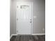 New front door with decorative glass insert and silver hardware at 4059 Canby Ln, Decatur, GA 30035