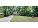 Well-maintained front yard with a 'For Sale' sign displayed at 4059 Canby Ln, Decatur, GA 30035