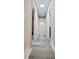 Long hallway with modern flooring and doors leading to various rooms at 4059 Canby Ln, Decatur, GA 30035