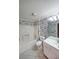 This bathroom features a shower-tub combo, toilet, and vanity with sink at 1800 Clairmont Lk # 630, Decatur, GA 30033