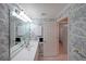 Classic bathroom with scenic wallpaper, vanity, sink and view into the hallway at 1800 Clairmont Lk # 630, Decatur, GA 30033