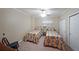 Inviting bedroom features two twin beds, complemented by a ceiling fan and ample closet space at 1800 Clairmont Lk # 630, Decatur, GA 30033