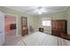 Neutral bedroom boasts ample space, complemented by classic furniture and decor at 1800 Clairmont Lk # 630, Decatur, GA 30033