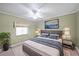 Contemporary bedroom with a cozy rug, modern furniture, stylish lamps and large window at 1800 Clairmont Lk # 630, Decatur, GA 30033