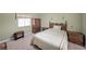 Cozy bedroom with classic wood furniture, neutral tones, and soft lighting, creating a warm ambiance at 1800 Clairmont Lk # 630, Decatur, GA 30033