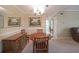 Formal dining area with a wooden table, a chandelier and a large mirror at 1800 Clairmont Lk # 630, Decatur, GA 30033