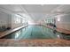 Indoor pool featuring tiled floors and ample natural light at 1800 Clairmont Lk # 630, Decatur, GA 30033