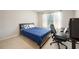 Cozy bedroom with natural light, desk and chair, perfect for relaxation and productivity at 2113 Soque River Dr, Duluth, GA 30097