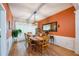 Elegant dining room with hardwood floors, stylish lighting, and a large mirror at 2113 Soque River Dr, Duluth, GA 30097