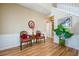 Welcoming foyer with beautiful wood floors, staircase, and ample natural light perfect for greeting guests at 2113 Soque River Dr, Duluth, GA 30097