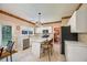 Bright kitchen with white cabinetry, a center island, and stainless steel appliances at 2113 Soque River Dr, Duluth, GA 30097