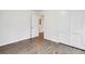 Clean bedroom with neutral walls, new floors and double closet at 329 Cranfill Se Rd, Marietta, GA 30060