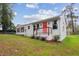 Inviting single-story home with a freshly painted exterior and a cozy front porch at 329 Cranfill Se Rd, Marietta, GA 30060