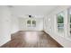 Bright living area with new floors, ceiling fan and large windows at 329 Cranfill Se Rd, Marietta, GA 30060