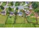 Neighborhood aerial view showing large green yards, mature trees and cul-de-sac streets at 3340 Deerwood Ln, Rex, GA 30273