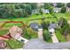 Overhead view of a well-maintained property with a spacious lawn and mature trees at 3340 Deerwood Ln, Rex, GA 30273