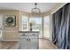 Charming breakfast nook featuring granite island and lots of natural light from the bay windows at 3340 Deerwood Ln, Rex, GA 30273
